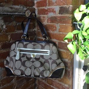 Coach leather purse with purple silk interior